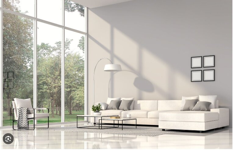 Comment améliorer la luminosité naturelle dans sa maison Salon lumineux avec grandes baies vitrées